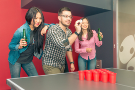 playing beer pong