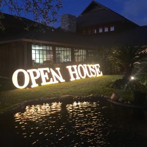 OPEN HOUSE marquee letters at night
