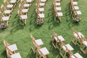 Rows of folding chairs outside wedding