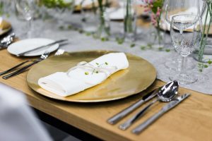 Gold plates on a wedding table