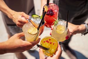 People holding drinks at a party
