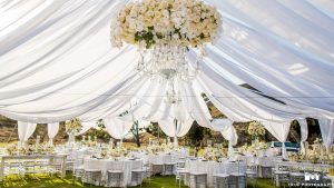 Large white tent for an outdoors wedding