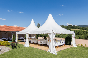 Two white tents at an event