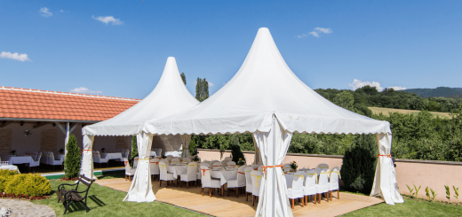 Two white tents at an event